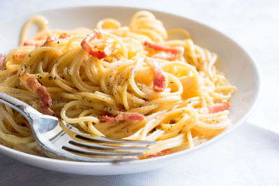 Close-up of noodles served in plate