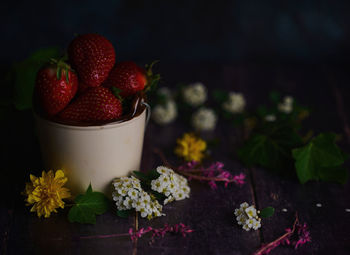 Close-up of red berries on table