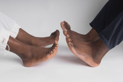 Close-up of human hand on white background