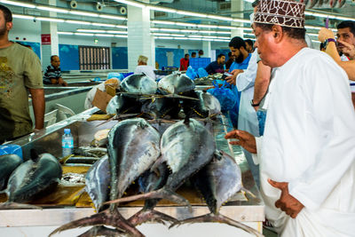 Group of people at fish market