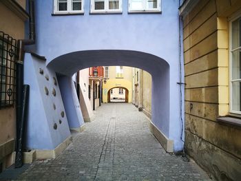 Alley amidst buildings in city