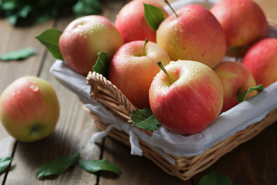 High angle view of apples in basket on table