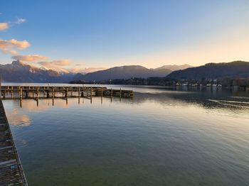 Scenic view of lake against sky during sunset