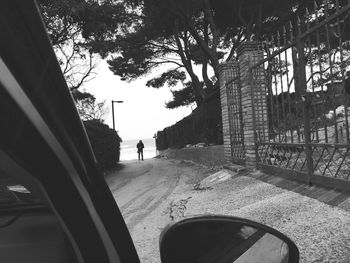 Low section of people walking on road