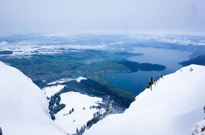 Scenic view of snow covered mountains