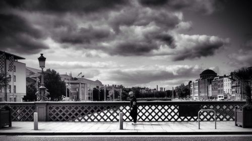 View of city against cloudy sky