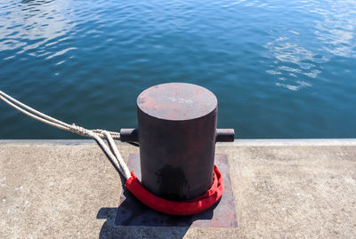 Different bollards and technical installations of vessel traffic at a port .