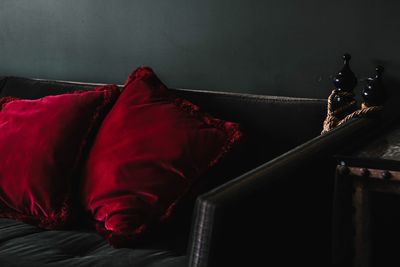 Red pillows on sofa at home