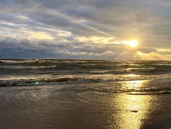 Scenic view of sea against sky during sunset