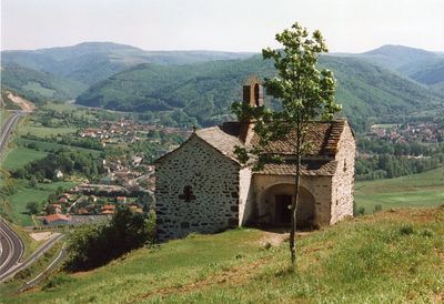 Built structure on landscape against clear sky