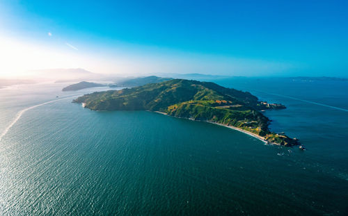 Aerial view of island in sea against sky