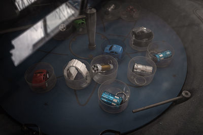 High angle view of bottles on table