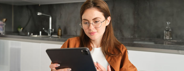 Young woman using mobile phone