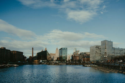 River by city against sky