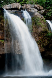 Scenic view of waterfall in forest