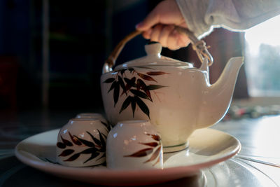 Close-up of coffee cup on table