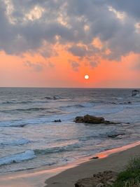 Scenic view of sea against sky during sunset