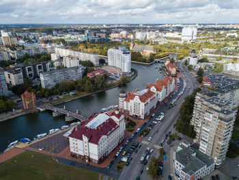 High angle view of river amidst buildings in city