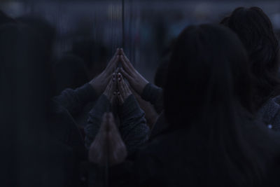 People touching on wall at korean war memorial