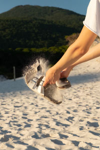 Sand in sandles at the beach