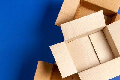 High angle view of stuffed toy against blue background