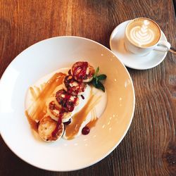 High angle view of breakfast served on table