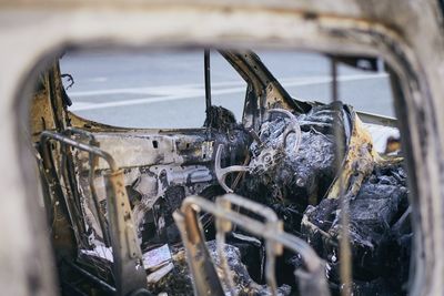 Close-up of abandoned rusty car