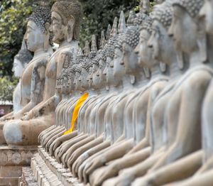 Statue of temple outside building