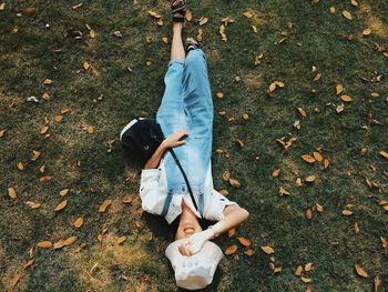 High angle view of woman on field during autumn