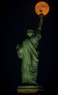 Low angle view of statue against the sky