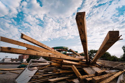 Old lumber wood structure against sky