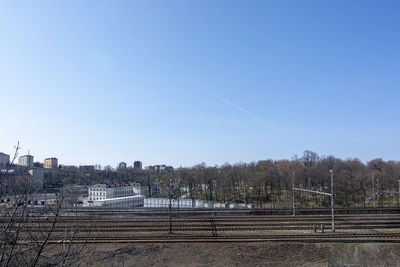 View of railroad tracks against clear sky