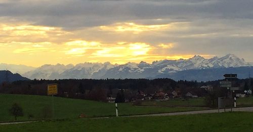 Scenic view of landscape against sky during sunset