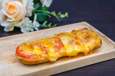 Close-up of food on serving tray at table