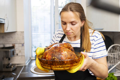 Close-up of man holding food