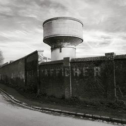 Low angle view of water tower against sky