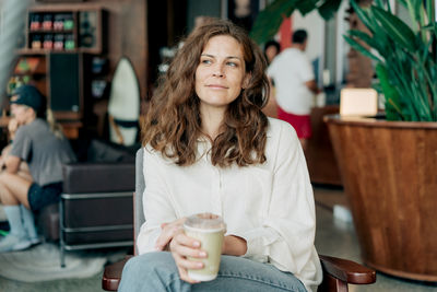 Young woman using mobile phone