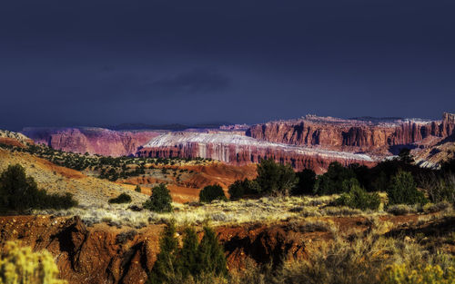 Panoramic view of landscape against cloudy sky