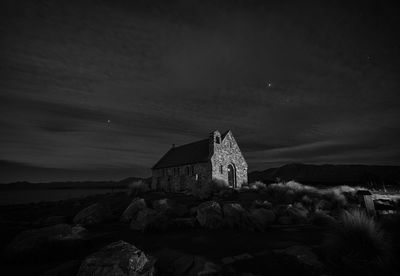 Church of the good shepherd against sky at night