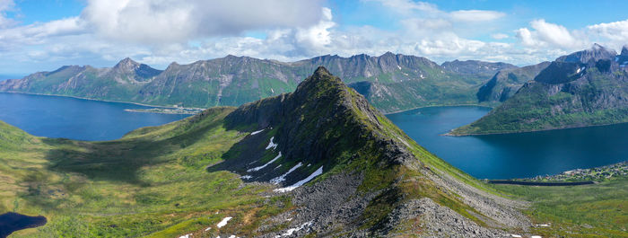 Panoramic view of lake and mountains against sky