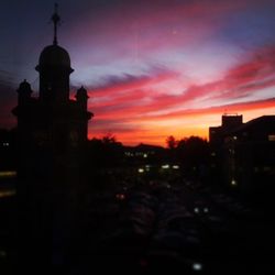 Silhouette of buildings at sunset