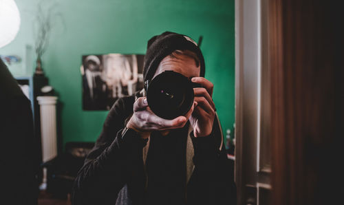 Close-up of man photographing