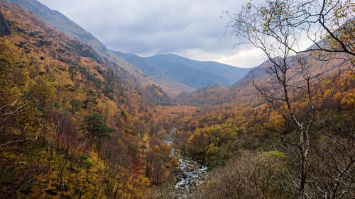 Scenic view of mountains against sky during autumn