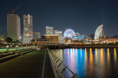 Illuminated buildings in city at night