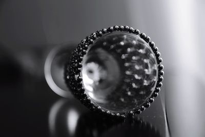 Close-up of crystal ball on metal