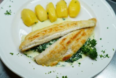 Close-up of fish served on plate