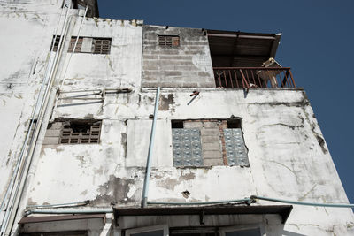 Low angle view of old building against clear sky