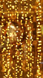 Defocused image of illuminated christmas lights