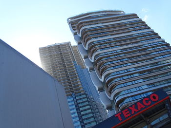 Low angle view of modern buildings against sky