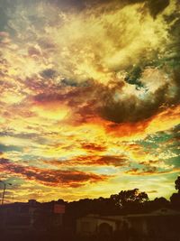 Low angle view of cloudy sky at sunset